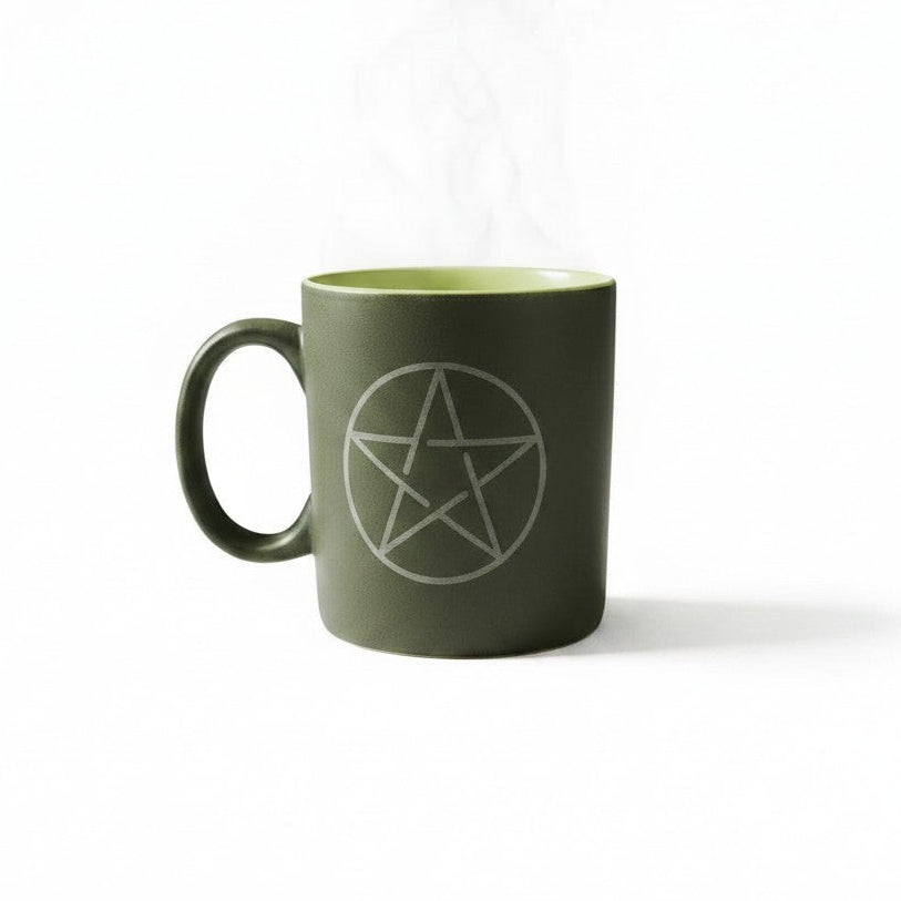 Pentagram Symbol Black Ceramic Spiritual Coffee Mug on a white background showing close up design detail.