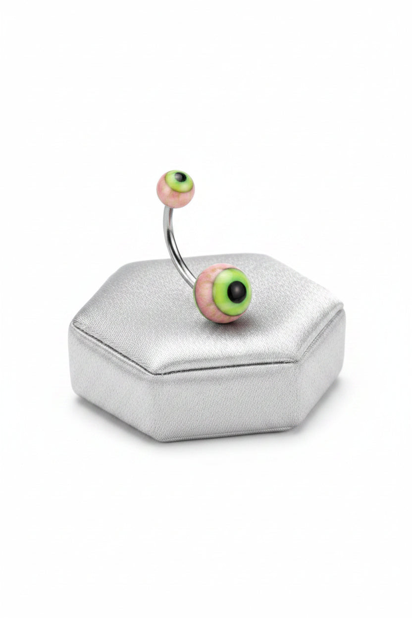 Pink Eyeball Acrylic Belly Button Ring  316l stainless steel on a silver jewelry display.
