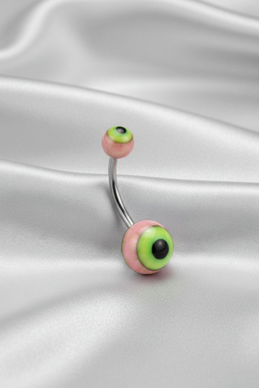 Pink Eyeball Acrylic Belly Button Ring  316l stainless steel on silver silk fabric.