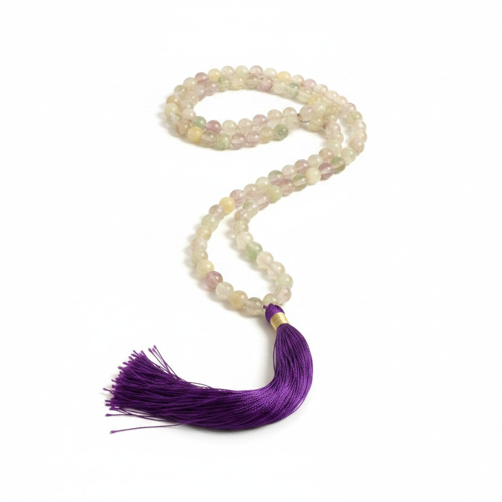 Rainbow Fluorite Bead Mala with Purple Silk Tassel on a white background showing bead and tassel detail.