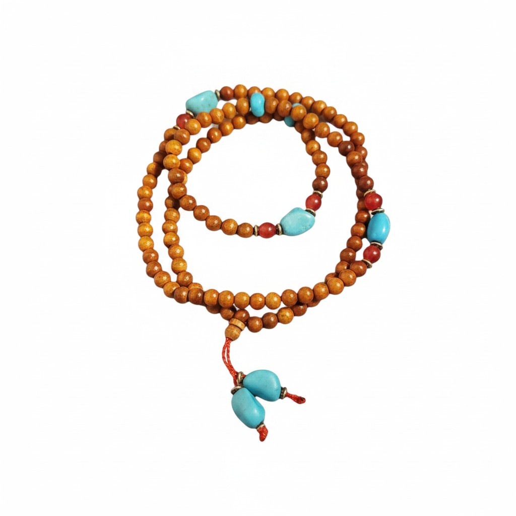 Rosewood and Turquoise Bead Mala with Turquoise Beaded Tassel on a white background showing bead and tassel detail.