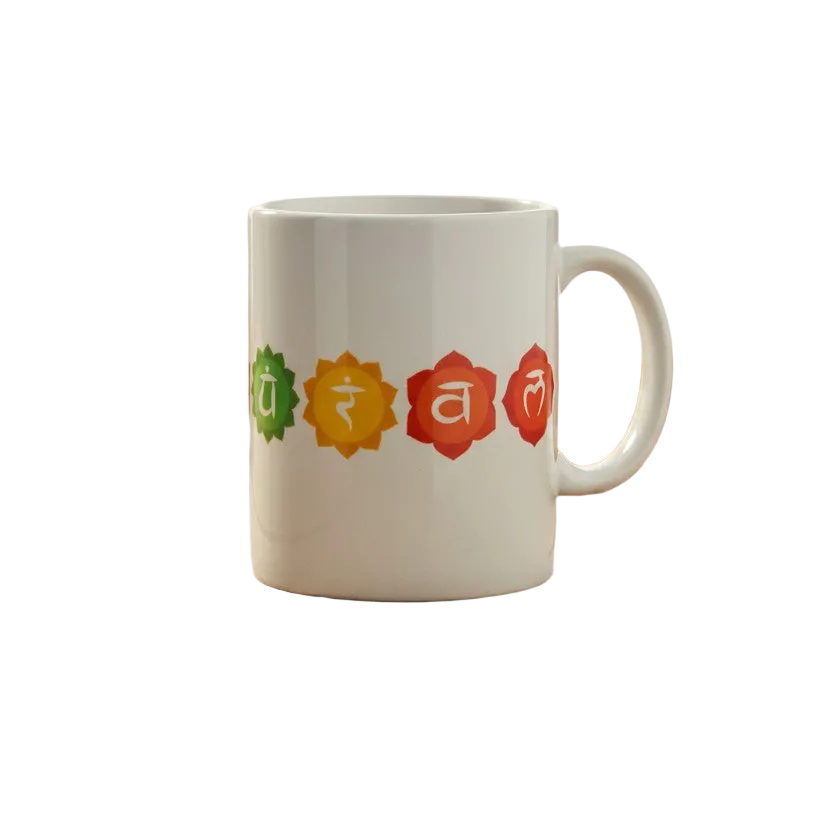Seven Chakra Symbols White Ceramic Spiritual Coffee Mug on a white background showing close up right side design detail.