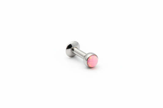 Internally Threaded Soft Pink Opal Labret Lip Ring in 316l stainless steel close up detail.