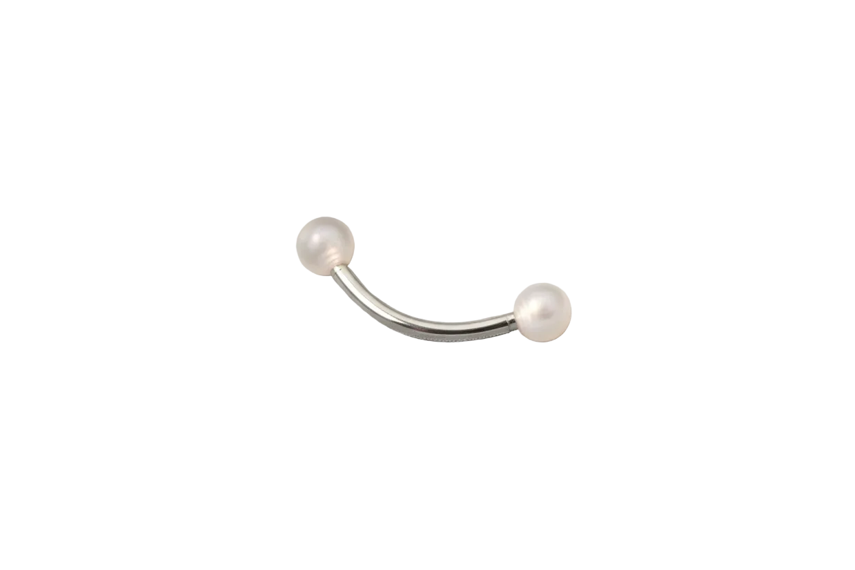Peach Glow Ball Acrylic Eyebrow Ring in 316l stainless steel close up detail.