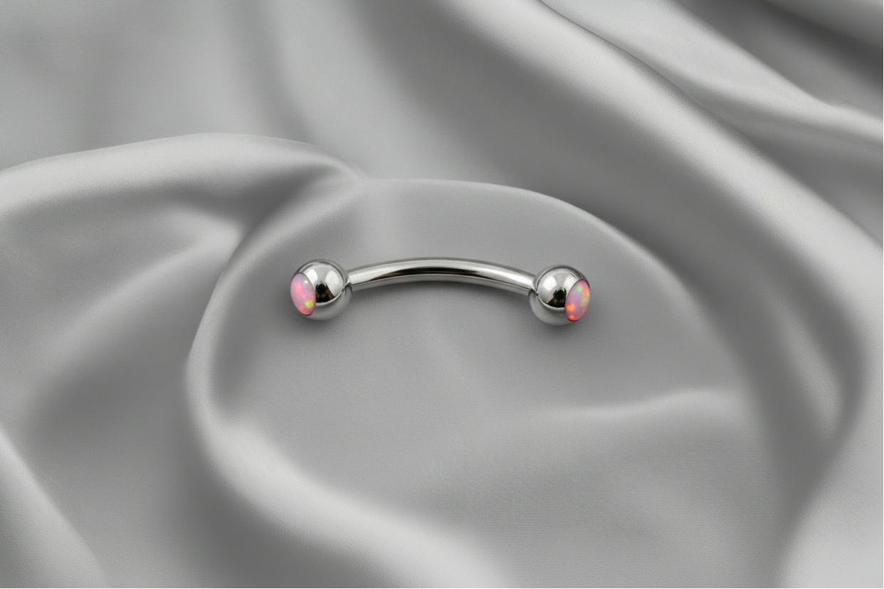 Pink Opal Eyebrow Ring in 316l Stainless steel.