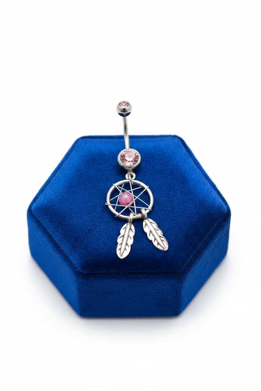 Pink Crystal Mystical Dream Catcher Belly Button Ring in 316l stainless steel on a blue velvet jewelry display.