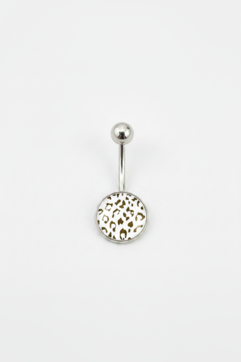 White Leopard Print Belly Button Ring in 316l stainless steel on a white background.