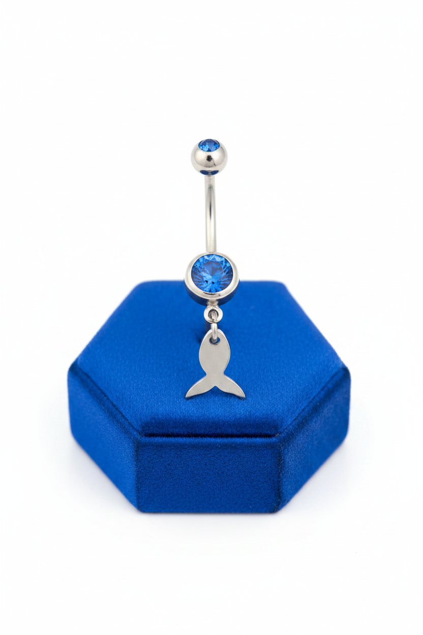 Blue Crystal Steel Fish Belly Button Ring in 316l stainless steel on a blue velvet jewelry display.
