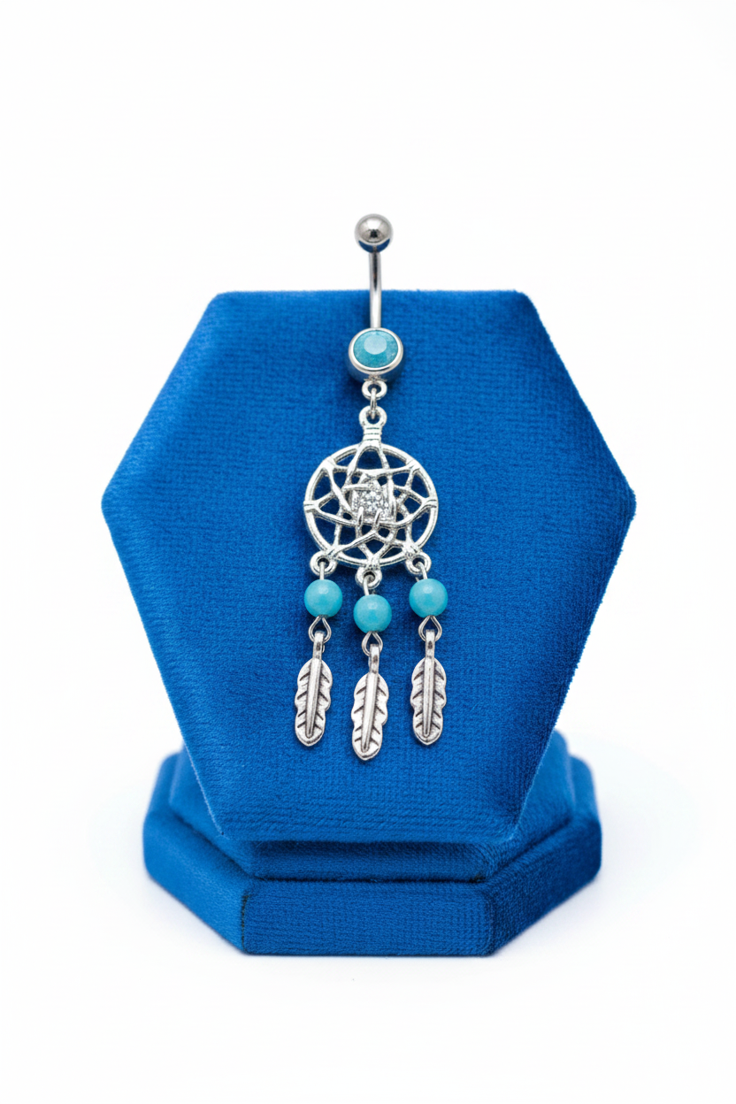 Aqua Crystal Dream Catcher Belly Button Ring in 316l stainless steel on a blue velvet jewelry display.