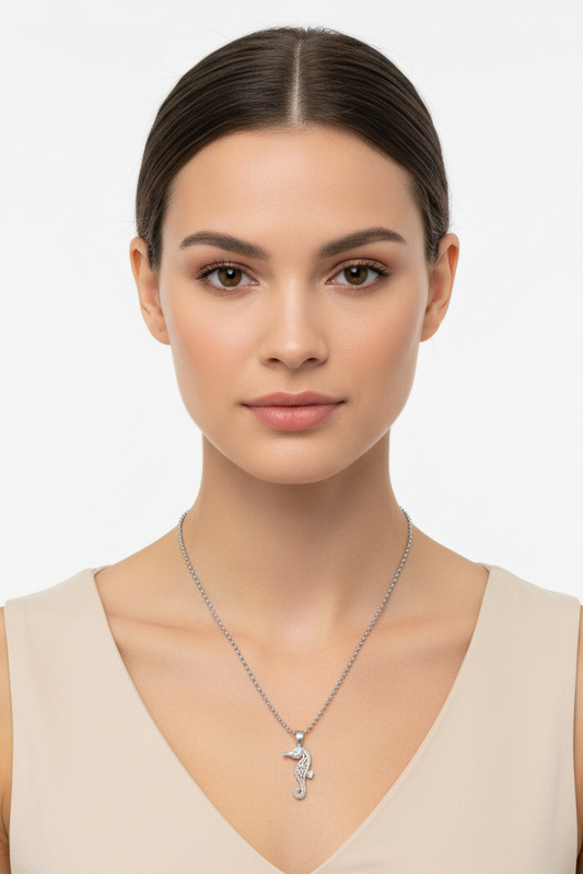 Seahorse Steel Chain Necklace in 316l stainless steel on a female model.