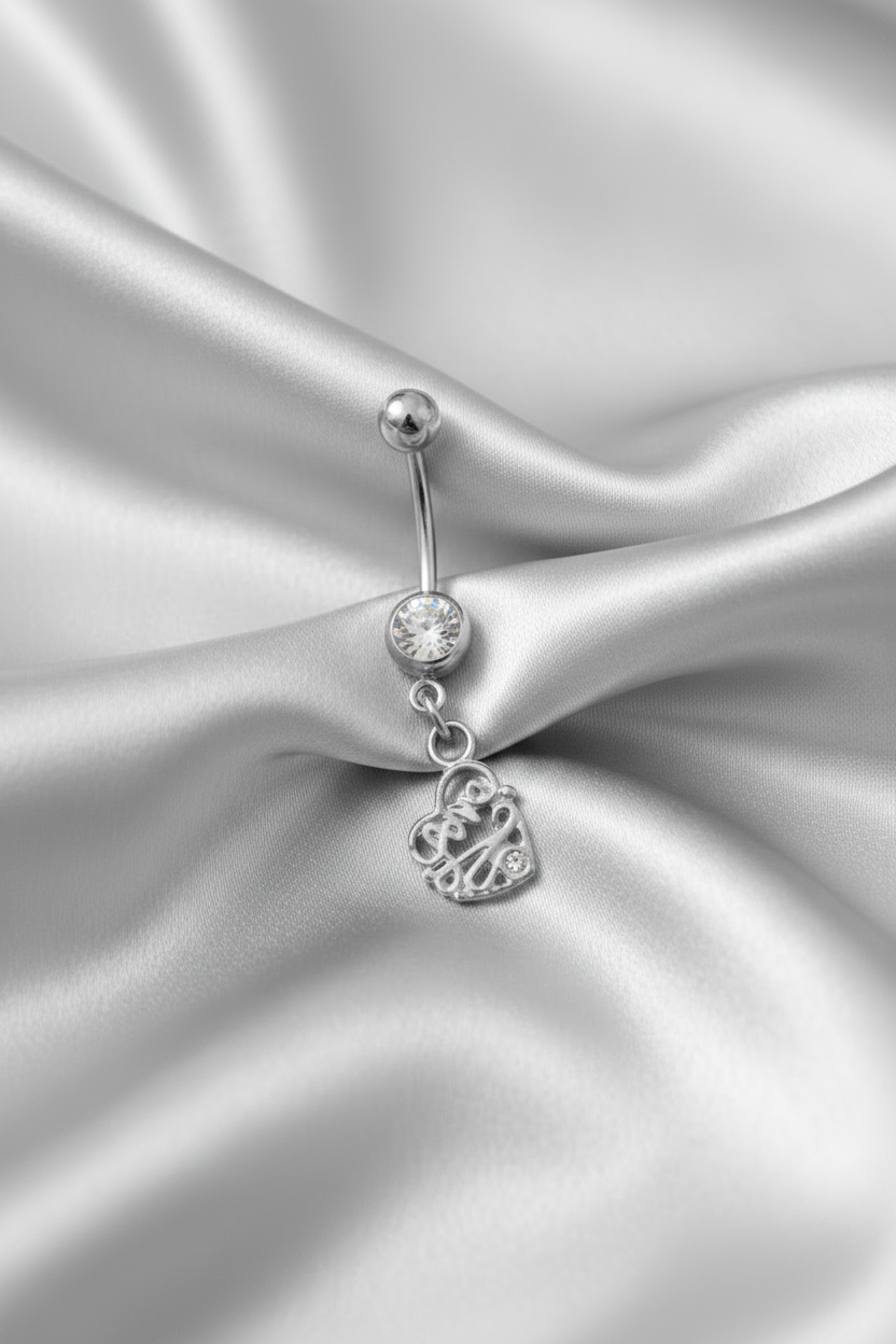 Clear Crystal "Love" Heart Belly Button Ring in 316l stainless steel.