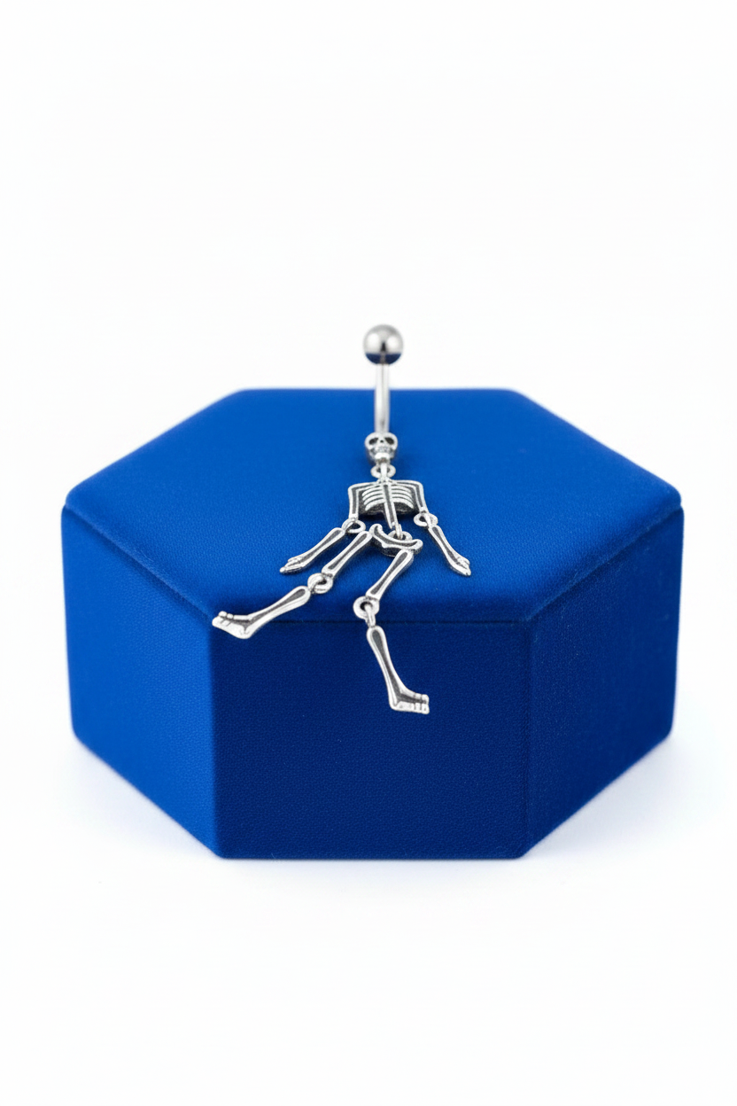 Black Dancing Skeleton Belly Button Ring in 316l stainless steel on a blue velvet jewelry display.