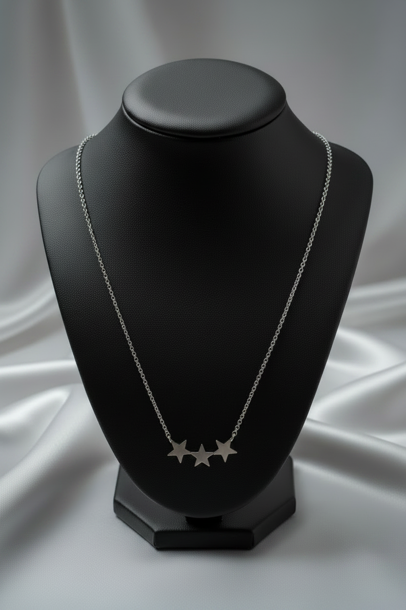 3 Stars Steel Chain Necklace in 316l stainless steel on a black bust.