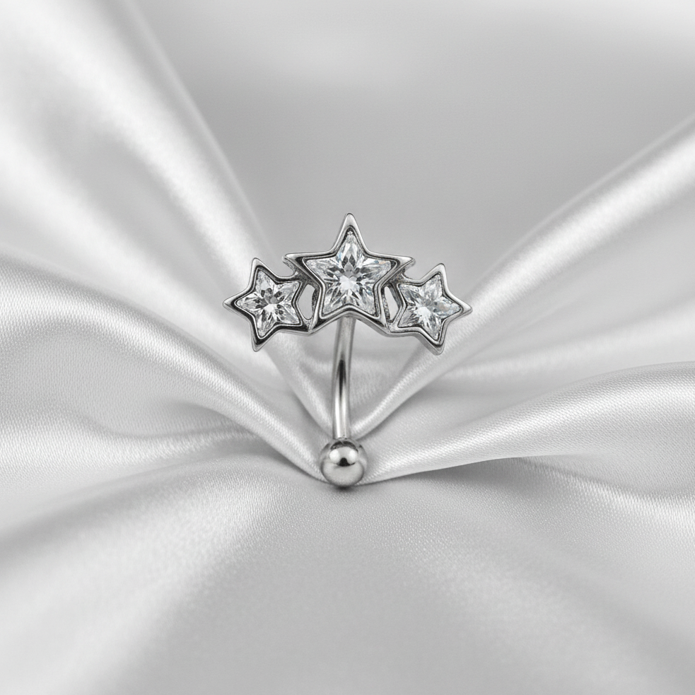 Clear Crystal Triple Star Eyebrow Ring in 316l stainless steel.