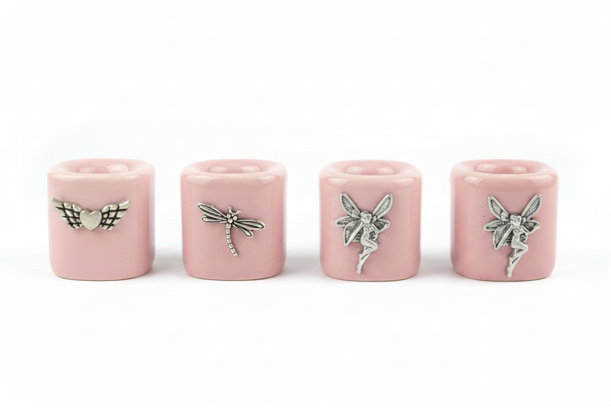Pink Assorted Designs Ceramic Mini Candle Holder Set of Four on a white background.