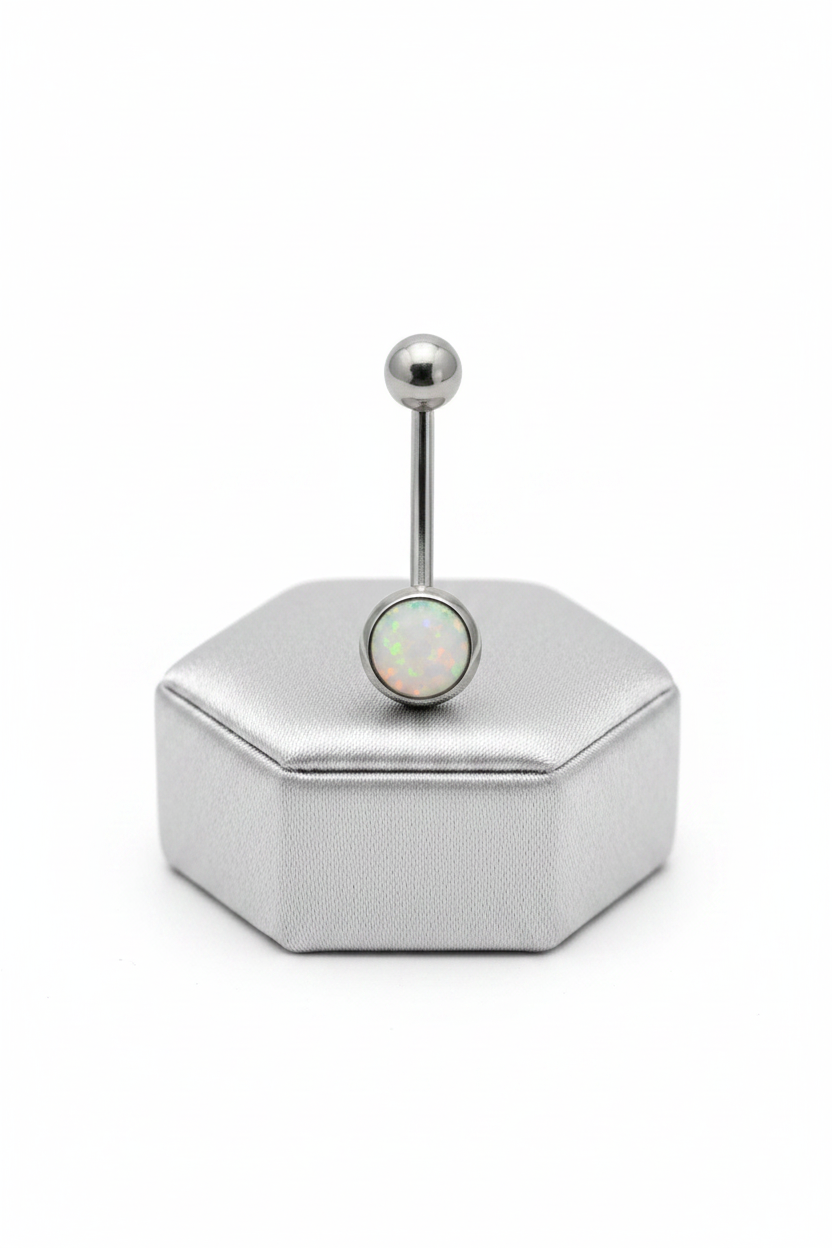 White Opal Belly Button Ring in 316l stainless steel on a sliver jewelry display upright position.
