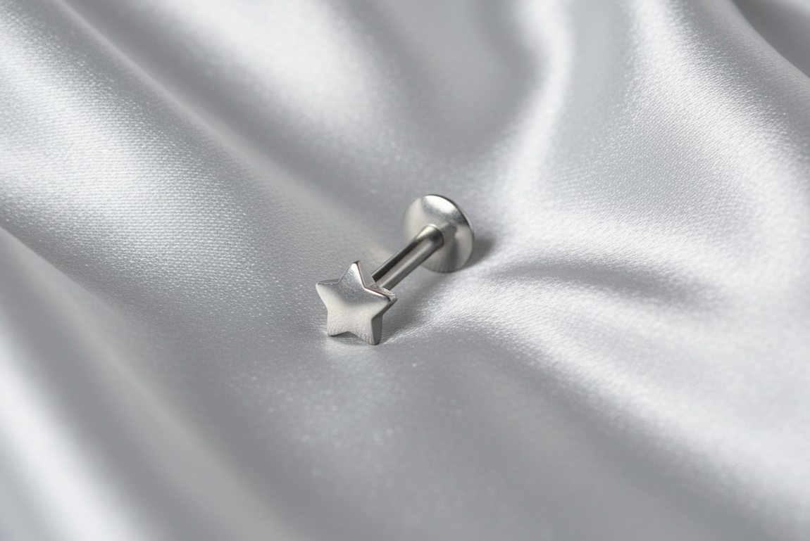 Internally Threaded Steel Star Labret Lip Ring in 316l stainless steel angled left.