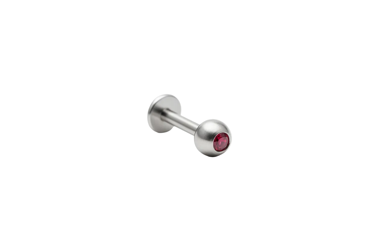 Red Crystal Labret Lip Ring in 316l stainless steel in close up detail.