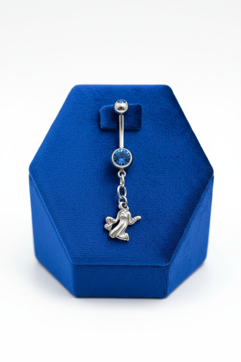 Blue Crystal Virgo Belly Button Ring in 316l stainless steel on a blue velvet jewelry display.