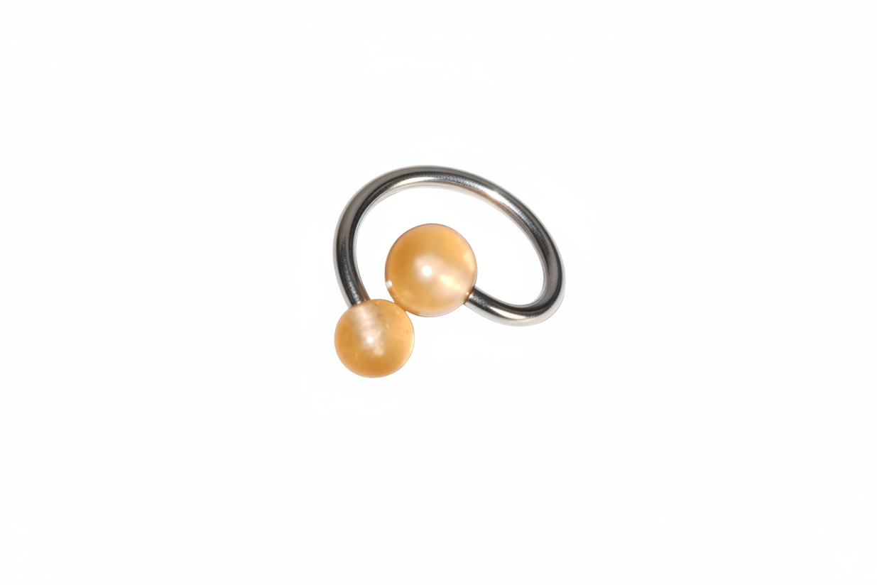 Orange Acrylic Glow Curled Barbell - 316L Stainless Steel close up detail.