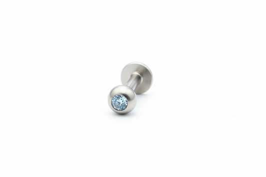Sky Blue Crystal Labret Lip Ring in 316l stainless steel close up detail.