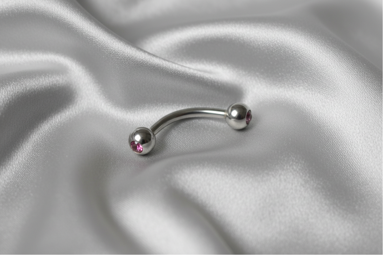 Purple Crystal Eyebrow Ring in 316l stainless steel.
