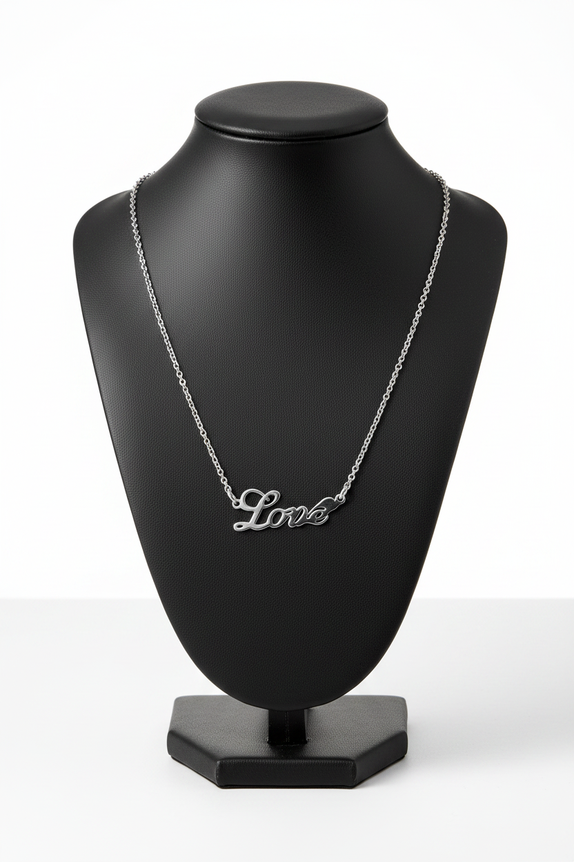 With "Love" Steel Chain Necklace in 316l stainless steel on a black bust with a white background.