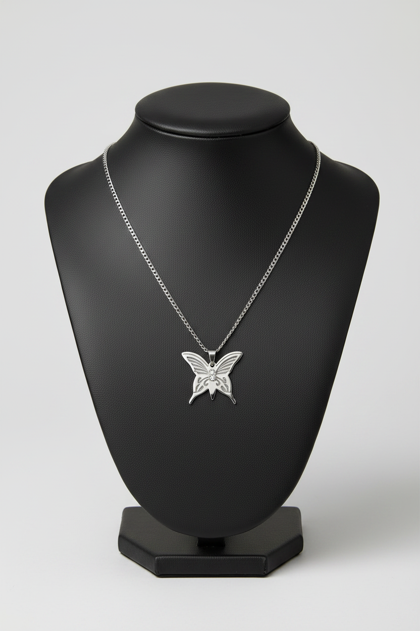Butterfly Steel Chain Necklace in 316l stainless steel on a black bust with a white background.
