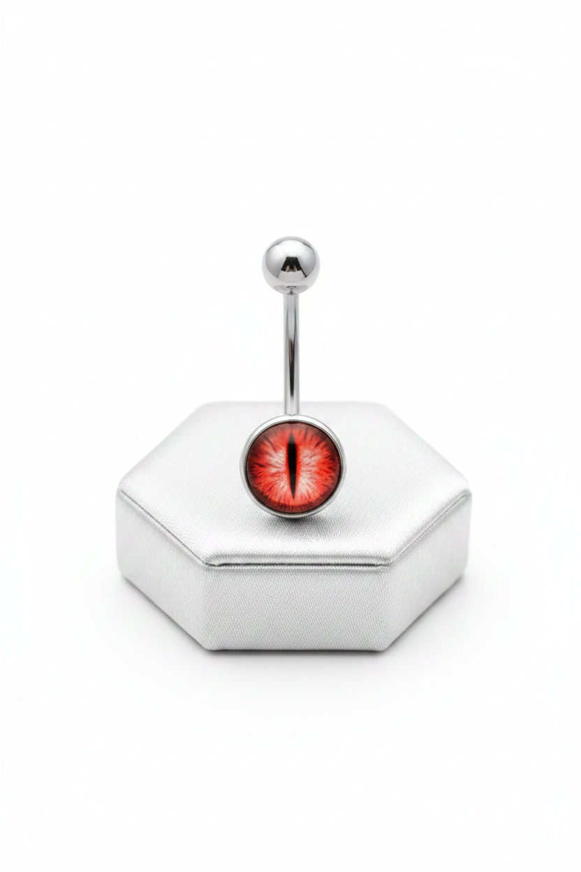 Red Snake Eye Belly Button Ring in 316l stainless steel on a silver silk jewelry display upright position.