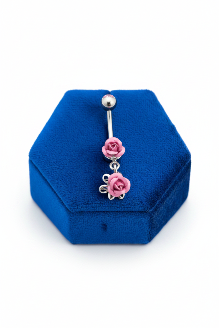 Double Pink Rose Belly Button Ring in 316l stainless steel. on a blue velvet jewelry display.