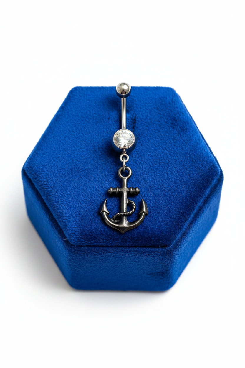 Clear Crystal Black Anchor Belly Button Ring in 316l stainless steel on a blue velvet jewelry display.