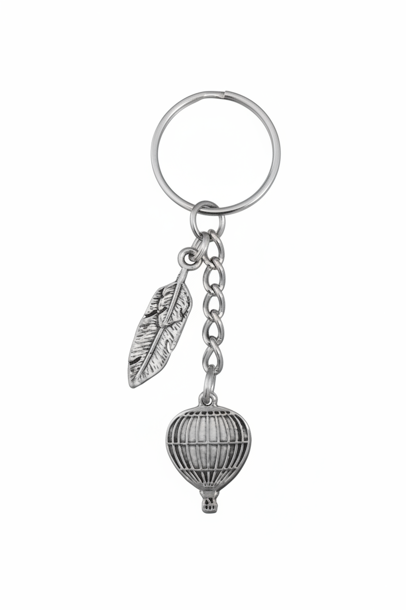 Hot Air Balloon and Feather Handmade Pewter Charm Keychain on a white background.