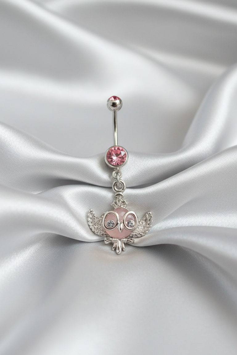 Pink Crystal Owl Belly Button Ring in 316l stainless steel.