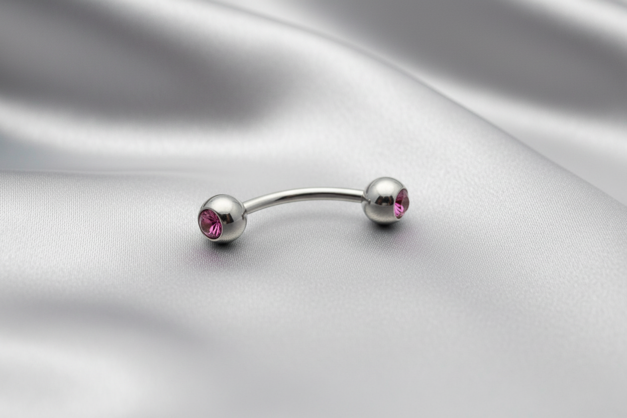 Purple Crystal Ball Eyebrow Ring in 316l stainless steel.