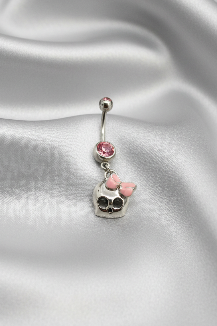 Pink Crystal Skull Belly Button Ring in 316l stainless steel.