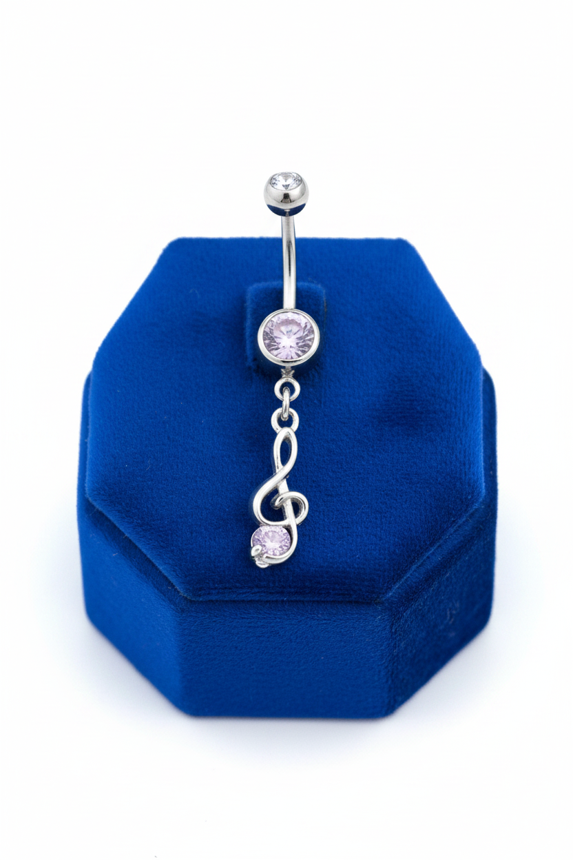 Purple Crystal Treble Clef Belly Button Ring in 316l stainless steel on a blue velvet jewelry display.