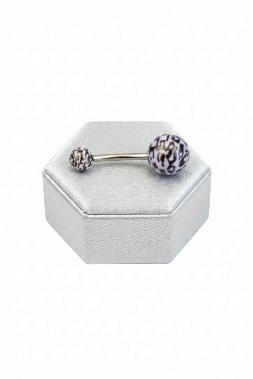 Blue Leopard Print Acrylic Belly Button Ring in 316l stainless steel on a silver jewelry display side angle view.