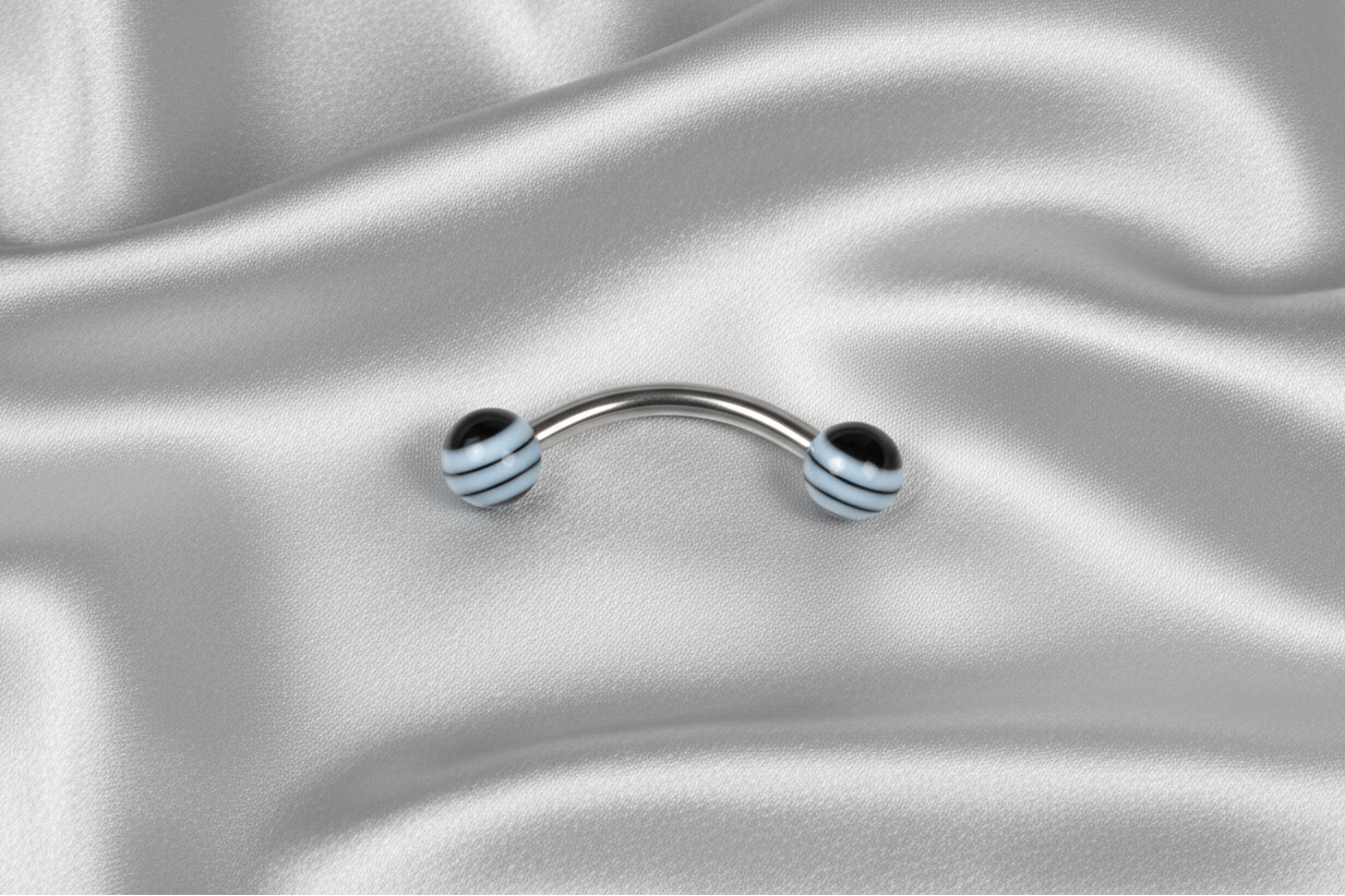 Black Pin Striped Acrylic Eyebrow Ring in 316l stainless steel.