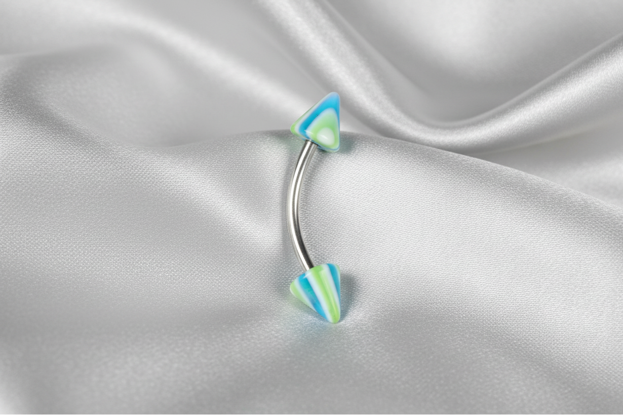 Blue and Green Spiked Acrylic Eyebrow Ring in 316l stainless steel.