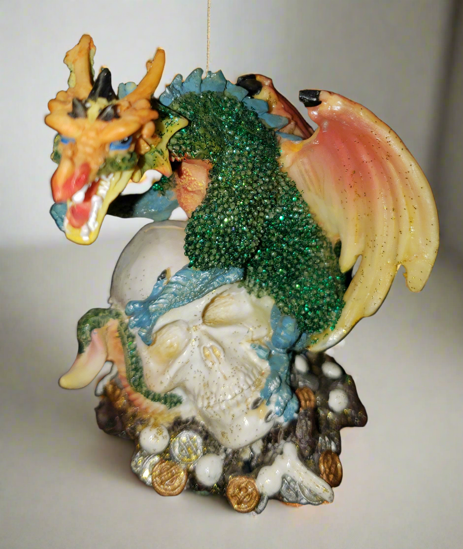 Dragon on Skull Head Green Figurine