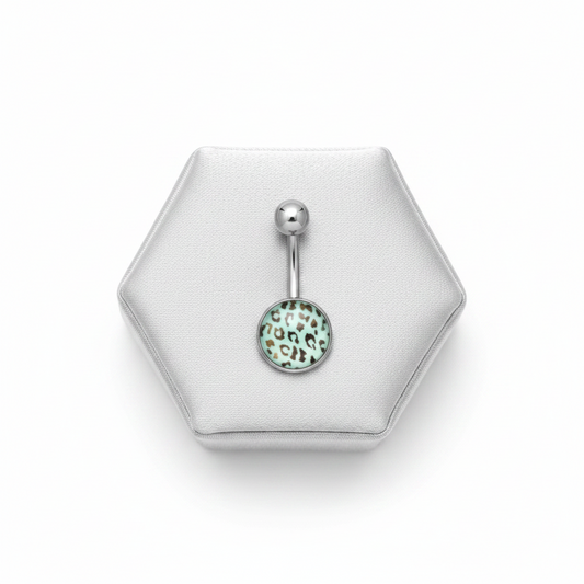 Blue Leopard Print Belly Button Ring in 316l stainless steel on a silver jewelry display.