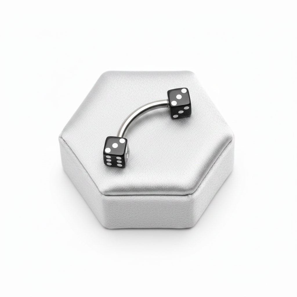 Black Acrylic Dice Eyebrow Ring in 316l stainless steel on a silver jewelry display.