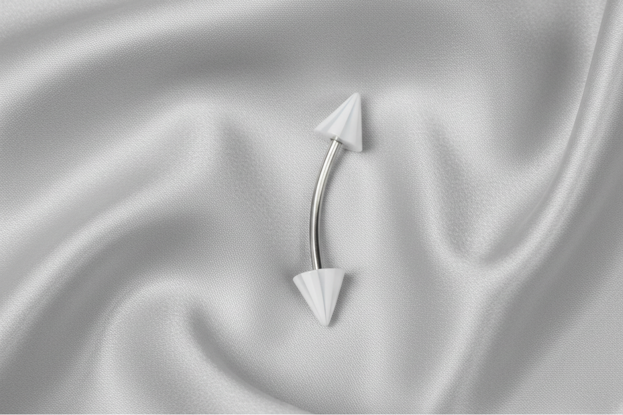 White Acrylic Spiked Eyebrow Ring in 316l stainless steel.