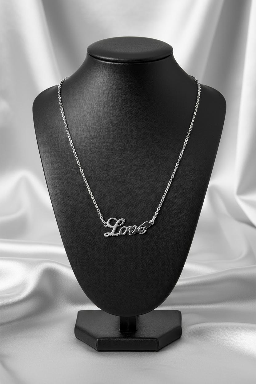 With "Love" Steel Chain Necklace in 316l stainless steel on a black bust.