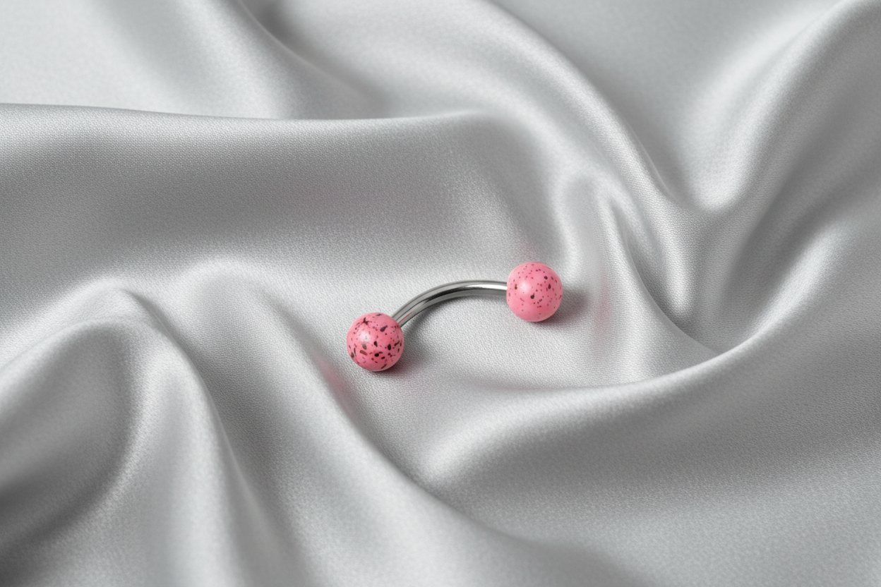 Pink Black Speckled Acrylic Eyebrow Ring in 316l stainless steel.
