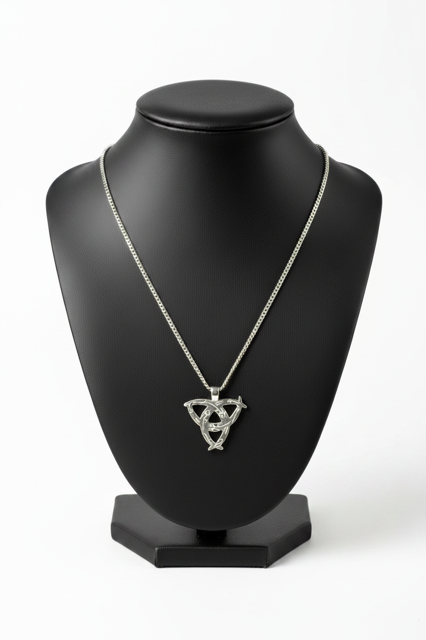 Mystical Triquetra Steel Chain Necklace in 316l stainless steel on a black bust with a white background.