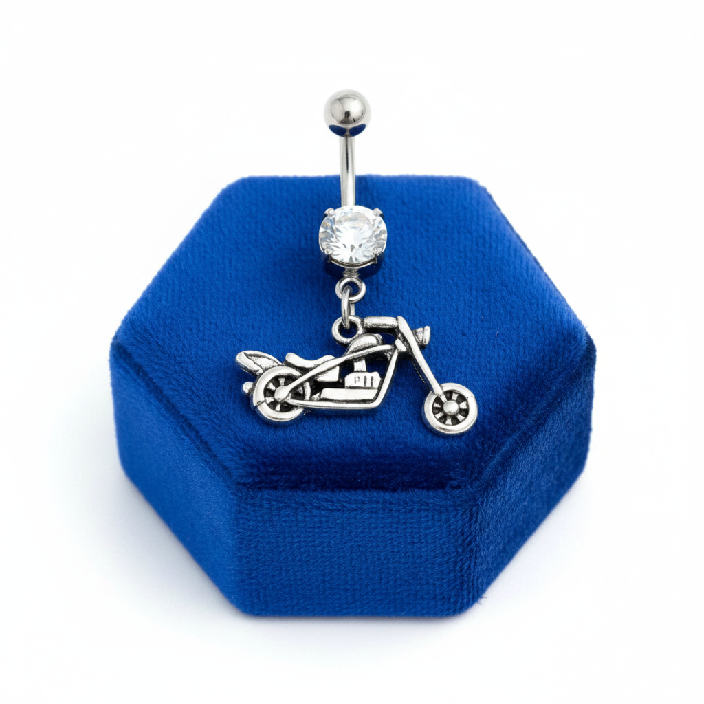 Clear Crystal Motorcycle Belly Button Ring in 316l stainless steel on a blue velvet jewelry display.