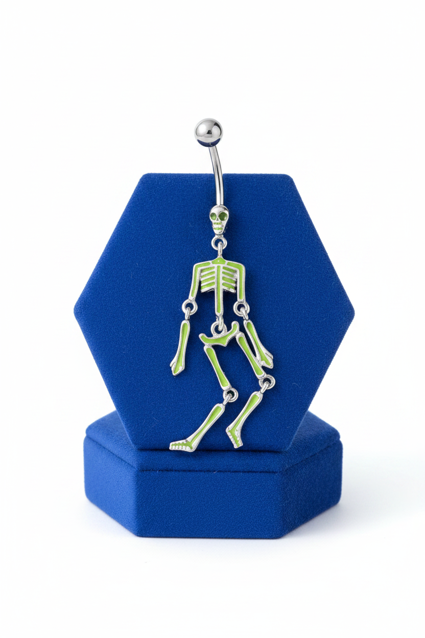 Green Dancing Skeleton Belly Button Ring in 316l stainless steel on a blue velvet jewelry display.