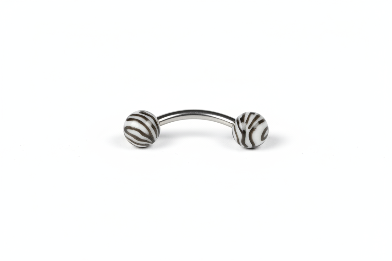 Black and White Tiger Striped Acrylic Eyebrow Ring in 316l stainless steel close up detail.