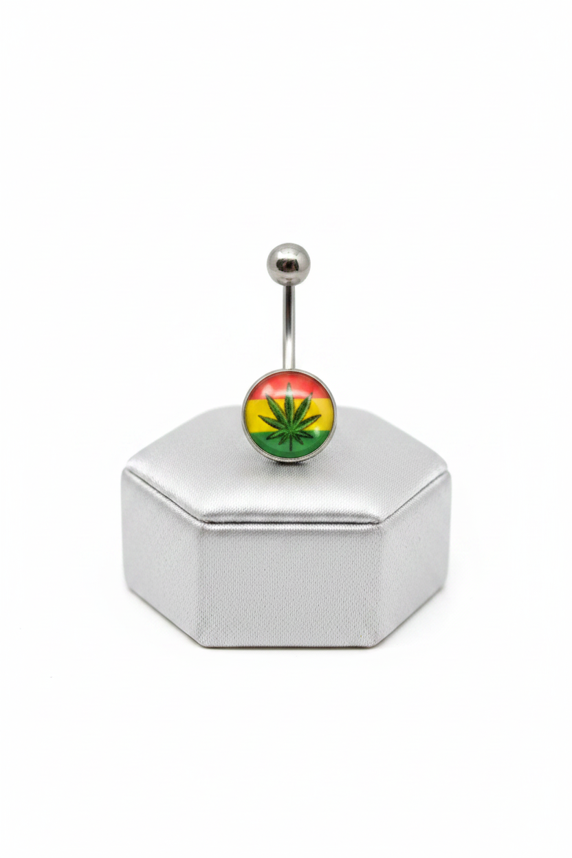 Green Leaf Rastafarian Belly Button Ring in 316l stainless steel on a silver silk jewelry display.